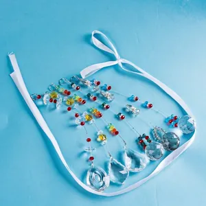 Detail view of colorful crystal prism suncatchers with faceted drop pendants