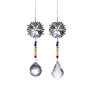 Detail of snowflake crystal suncatchers with rainbow beads and faceted glass pendants