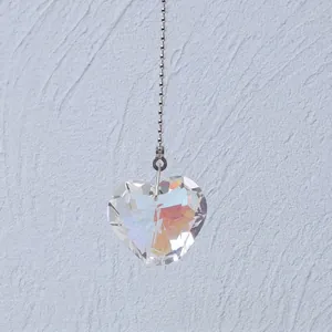 Detailed view of iridescent heart crystal pendant with durable silver bead chain