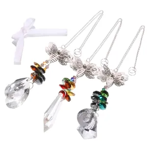Macro detail of sparkling crystal bee pendants with colorful glass beads and chain