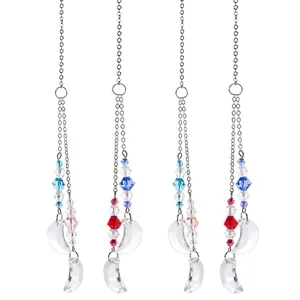 Detail of crystal suncatcher pendants with faceted colorful beads and crescent moon drops.