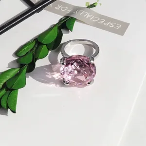Macro view of a large pink crystal napkin ring with a faceted diamond design decoration
