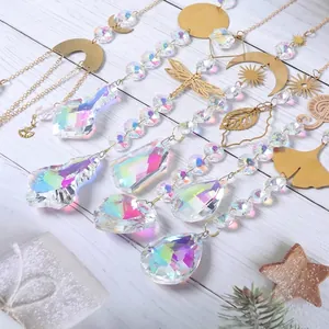 Detailed view of AB color crystal suncatchers with golden moon and ginkgo leaf charms
