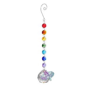 Rainbow crystal suncatcher with seven colored beads and a decorative butterfly charm