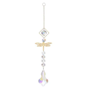 Detail of golden dragonfly suncatcher with AB crystal beads for garden decor