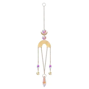 Detailed macro view of a gold celestial suncatcher with iridescent AB crystal prisms