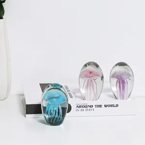 Ornements de méduses en cristal faits à la main dans des œufs en verre coloré décor
