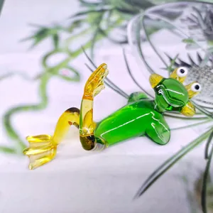 Macro detail of a whimsical green glass frog figurine in a relaxing reclining pose