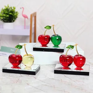 Set of elegant crystal cherry ornaments with mirrored bases for home and car decor
