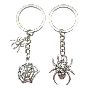 Detailed silver alloy spider and spiderweb Halloween keychains for bags and keys