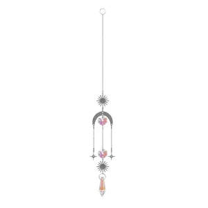 Detail of silver suncatcher with sun, moon, and star charms and prismatic crystals