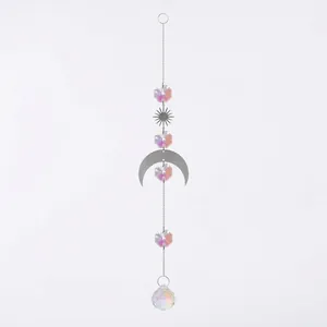 Detailed full view of silver crystal suncatcher with moon and star metal charms