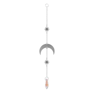 Detail shot of a silver moon suncatcher with celestial stars and crystal prism pendant