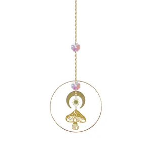 Gold mushroom suncatcher with AB crystals and celestial charms for garden decor
