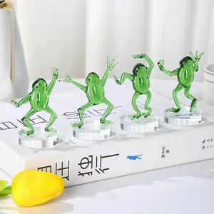 Set of handcrafted green glass kung fu frog figurines displayed as home desk decor