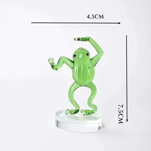 Dimension view of a green glass kung fu frog figurine, height 7.5cm and width 4.5cm