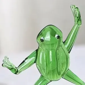 Detailed close-up of a whimsical green glass frog figurine in a kung fu fighting pose