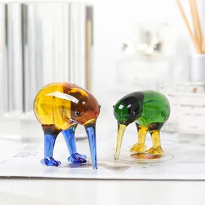 Detailed view of handcrafted colorful glass bird figurines for home office decor
