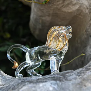Detailed view of hand-blown glass lion figurine with elegant gold-painted mane accents