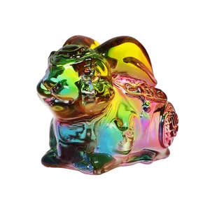 Close-up detail of a colorful iridescent crystal rabbit ornament with gradient rainbow colors