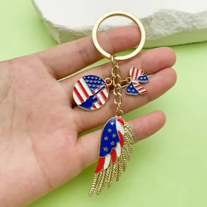 Detail of American flag themed keychain with stars and stripes charms and golden ring