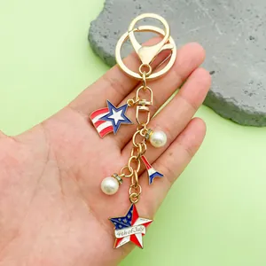 Detailed macro view of USA Independence Day keychain featuring star and pearl charms