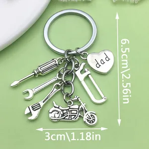 Detailed macro view of Father's Day tool keychain showing dimensions: 6.5cm x 3cm