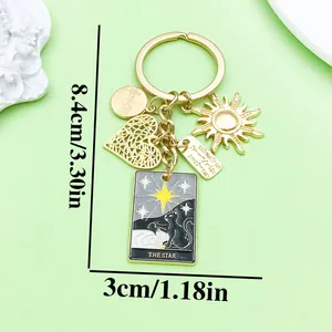 Detailed view of the tarot star cat keychain showing dimensions of 8.4cm by 3cm