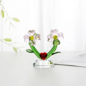 Exquisite crystal flower craft ornament featuring pink blossoms and a red heart detail