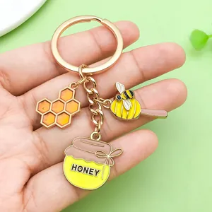 Mignon Porte-clés Abeille Nid d'Abeille Émail Alliage Tournesol Marguerite Charme Sac Pendentif Anneau Porte-clés Bijoux de Mode Cadeau pour Femmes Filles