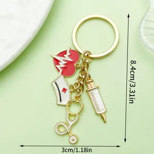 Close-up showing dimensions of a nurse-themed medical keychain with enamel charms.