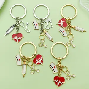 Medical themed keychains featuring nurse cap, stethoscope, and ECG charms in gold and silver