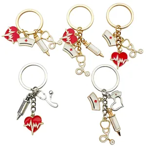 Detailed view of various medical themed keychains featuring nurse hat and stethoscope charms.