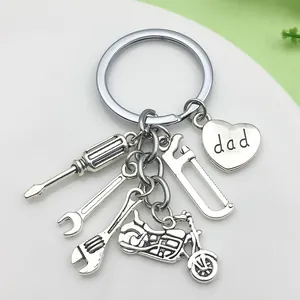 Father's Day keychain with tool charms and heart 'dad' pendant for men