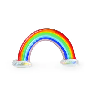 Detailed view of a miniature handmade glass rainbow figurine with clear cloud bases.