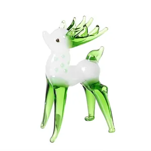 Handcrafted green and white glass deer figurine, ideal for Christmas home decor.