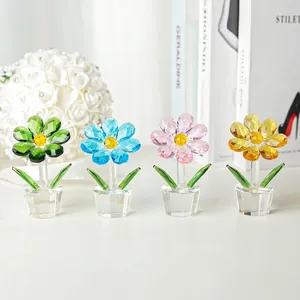 A vibrant set of four crystal sunflower figurines for home office desk decoration