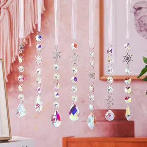 Detailed view of seven diverse crystal suncatchers with snowflake charms and octagonal beads