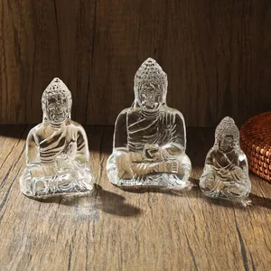 Set van drie transparante kristallen Boeddhabeelden voor een zen-interieurdecoratie