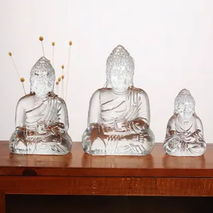 Set van drie transparante kristallen Boeddhabeelden in verschillende maten decor