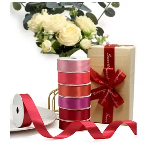Detailed view of colorful satin ribbons for elegant gift packaging and wedding decor