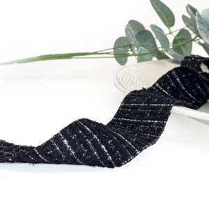 Black tweed ribbon with silver metallic thread for luxury gift wrapping and DIY crafts.