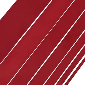 Various widths of deep red satin ribbons for gift packaging and wedding decoration