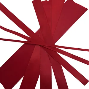Assorted widths of burgundy satin ribbons for luxury gift wrapping and wedding decor