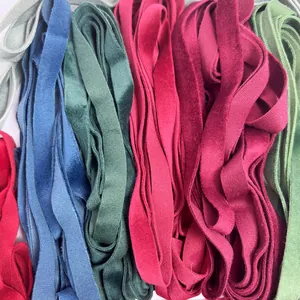 Multi-color 1cm single-sided flocked velvet ribbons for DIY gift wrapping and decoration.