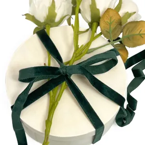 1cm dark green single-sided velvet ribbon tied on a white gift box with elegant roses