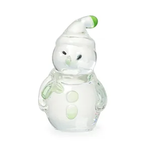 Close-up of a clear crystal snowman figurine with green accents for Christmas decoration.