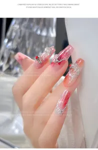 Detail view of 5D stereoscopic relief butterfly nail stickers on pink marble nails