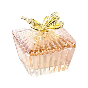 Elegant champagne glass jewelry box with a golden butterfly lid for nail art storage