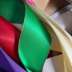 Vibrant multicolored polyester ribbons with metallic gold and silver edges for gifts.